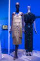 Africa’s Fashion Diaspora exhibition installation view of two mannequins in a white fringed dre…