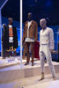Africa’s Fashion Diaspora exhibition installation view of three mannequins in black, brown and …