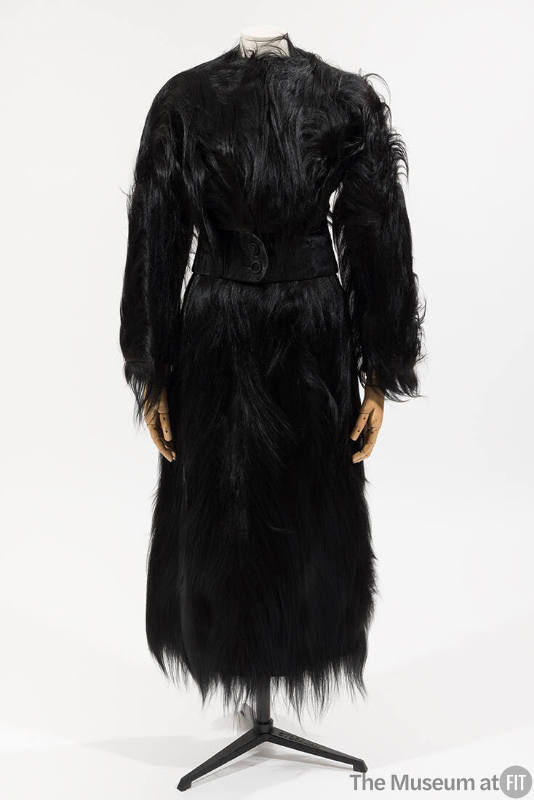 Black monkey fur suit with cropped jacket and calf length skirt