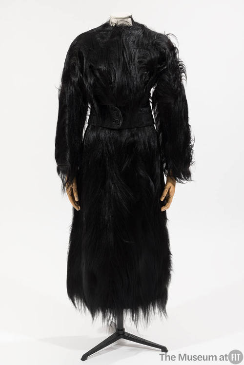Black monkey fur suit with cropped jacket and calf length skirt