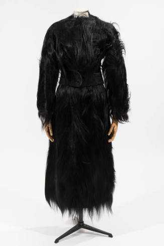 Black monkey fur suit with cropped jacket and calf length skirt
