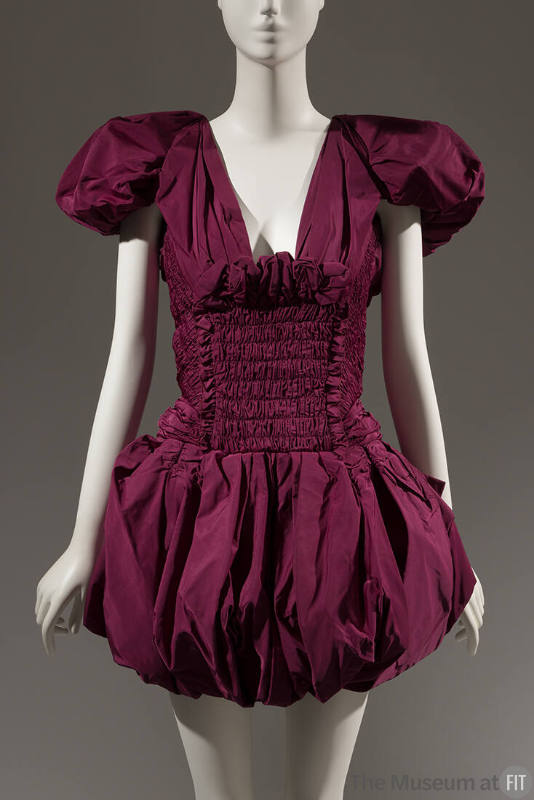 Purple mini dress with short pouf sleeves, smocked midriff and gathered bubble skirt