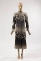 Calf length coat with blind colony photo print throughout and short stand collar
