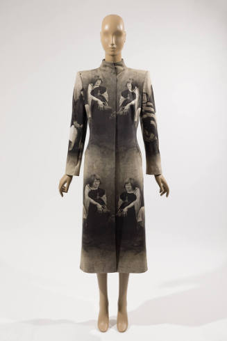Calf length coat with blind colony photo print throughout and short stand collar