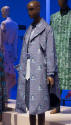 Ensemble of purple and blue print with portrait medallions: shawl collar trench style coat, sna…