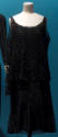 Black lace two-piece evening dress with round neck and slightly flared tunic top and matching s…