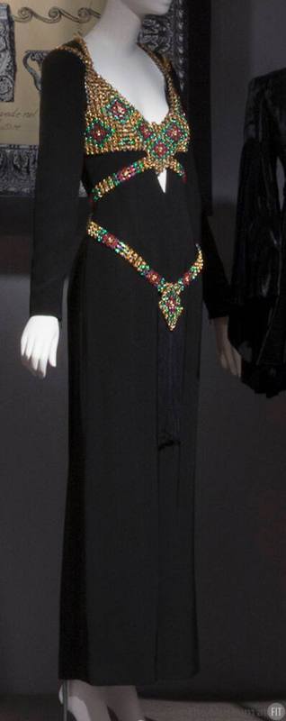 Black floor length evening dress with long sleeves, deep V neckline and multicolor chain mail h…