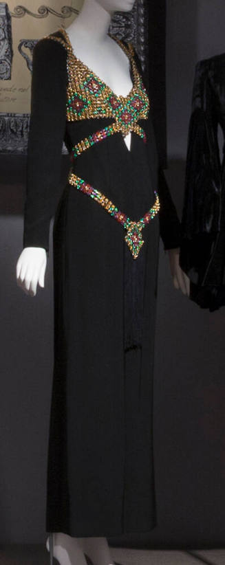 Black floor length evening dress with long sleeves, deep V neckline and multicolor chain mail h…