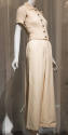 Off-white short sleeve ribknit sweater with silver buttons and matching wide leg pants