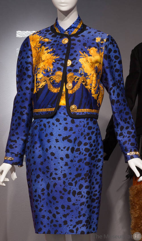 Blue and black leopard print suit with yellow and gold floral and baroque overprint, cropped co…