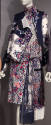 Red, white, blue and navy blue floral print ensemble of band collar jacket, high band collar bl…