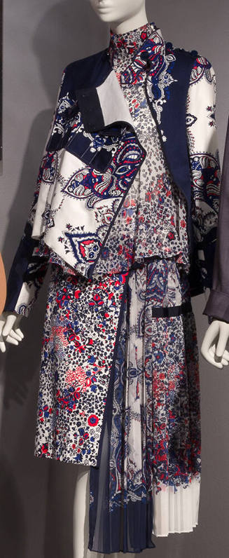 Red, white, blue and navy blue floral print ensemble of band collar jacket, high band collar bl…