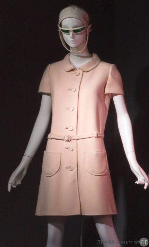 Pale pink short sleeve above the knee dress with roll collar, button front closure, patch pocke…