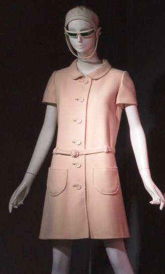Pale pink short sleeve above the knee dress with roll collar, button front closure, patch pocke…