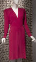 Magenta long sleeve calf length dress with padded shoulders, slanted inserts around deep V-neck…