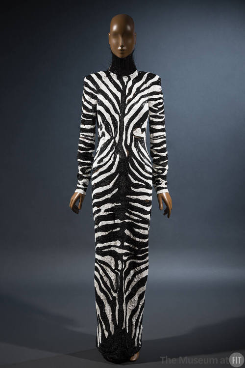 Black and white beaded zebra print long sleeve floor length evening gown with black high neck