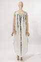 Back view of silver sleeveless dress showing ankle length back hem