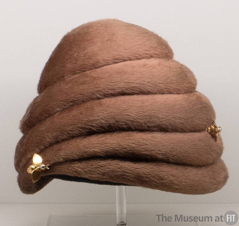 Taupe fur felt hat in the shape of a beehive with small gold metal and faux pearl bee pins