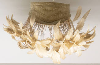 Beige alligator choker with matching feather plume fringe extending from bottom