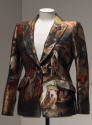 Silk jacquard jacket printed with imagery from Hieronymus Bosch paintings on black ground in re…