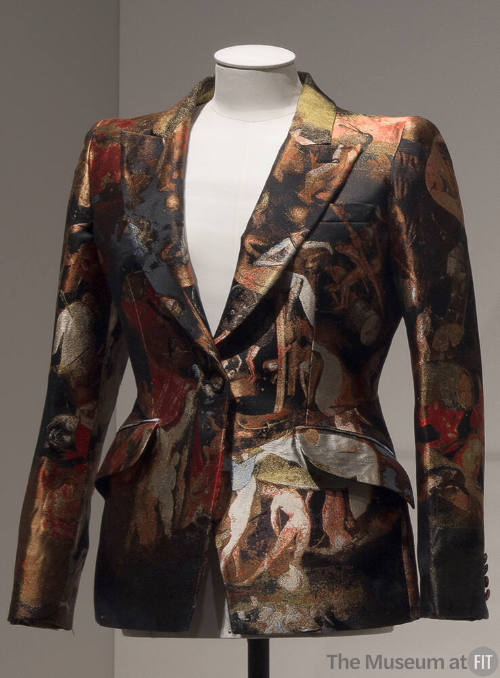 Silk jacquard jacket printed with imagery from Hieronymus Bosch paintings on black ground in re…
