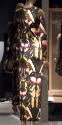 Long sleeve floor length fitted dress with repeating green, pink and black moth print