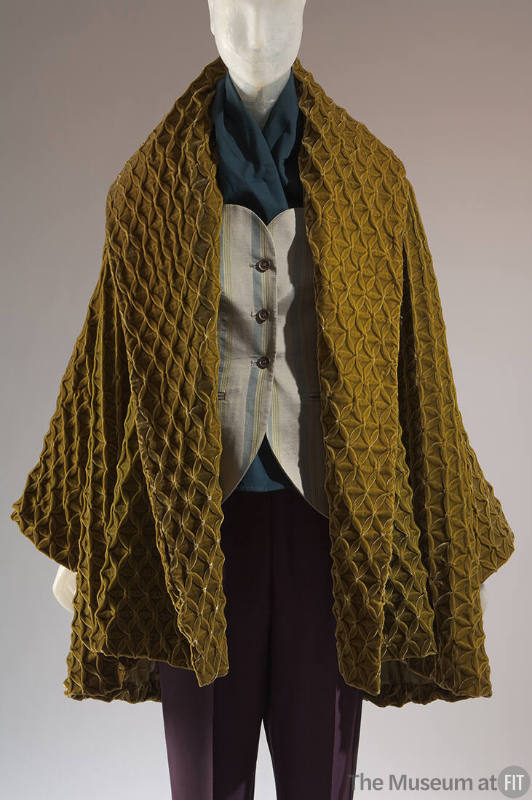 Gold floral woven velvet long sleeve jacket with wide lapels, beige button front blue and yello…