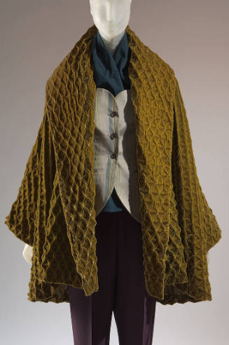 Gold floral woven velvet long sleeve jacket with wide lapels, beige button front blue and yello…