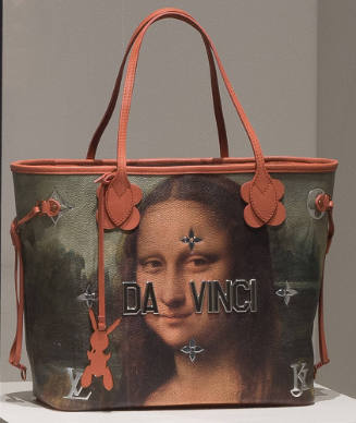 Large tote bag with close up of the Mona Lisa’s face, black “Da Vinci” text in center, pink sho…