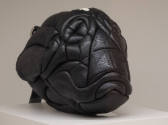 Alternate view of black leather skull bag showing quilting at front