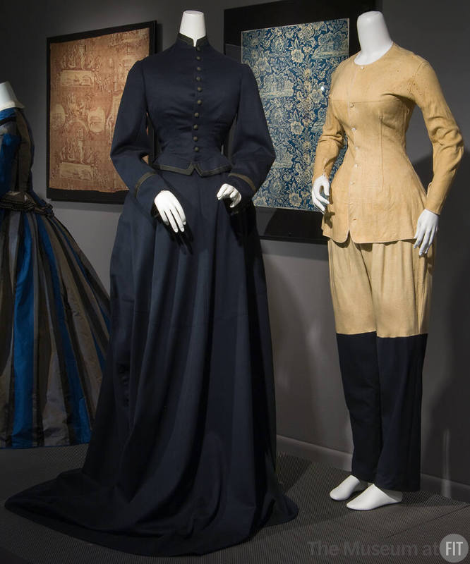 Two-piece floor length navy blue dress on left and coordinating beige long sleeve undershirt wi…