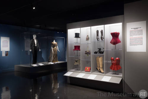 Dress, Dreams, and Desire exhibition introductory gallery with accessories and costume