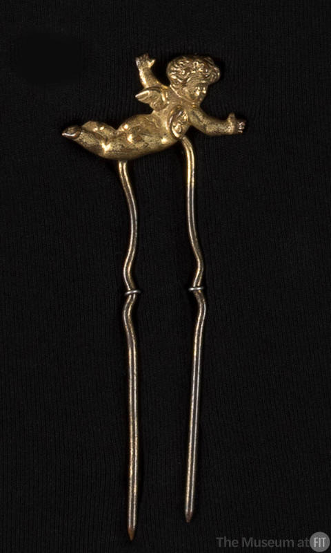 Gold hairpin with flying cherub on top 