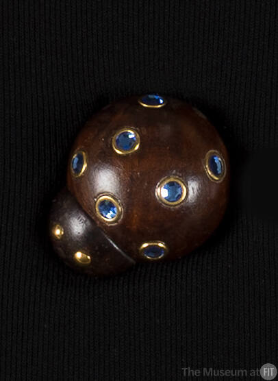 Dark brown wood lady bug pin with gold eyes and gold and blue rhinestone bezel body dots 