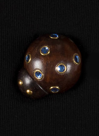 Dark brown wood lady bug pin with gold eyes and gold and blue rhinestone bezel body dots 