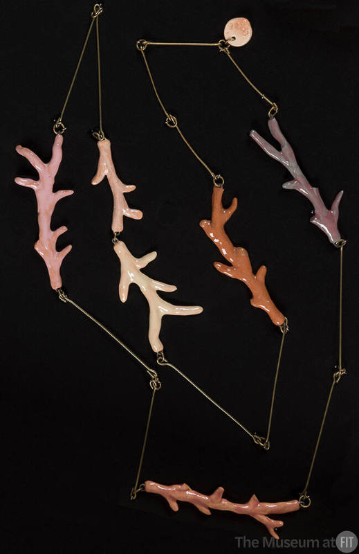 Necklace of pink, purple and orange porcelain coral branches linked with silver wire 
