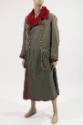 Man’s green military style coat with notched collar lined in red fur, double breasted with silv…