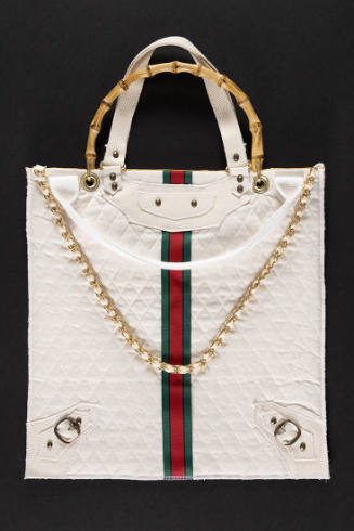 White square tote bag with double white and bamboo top handles, gold chain shoulder strap and a…