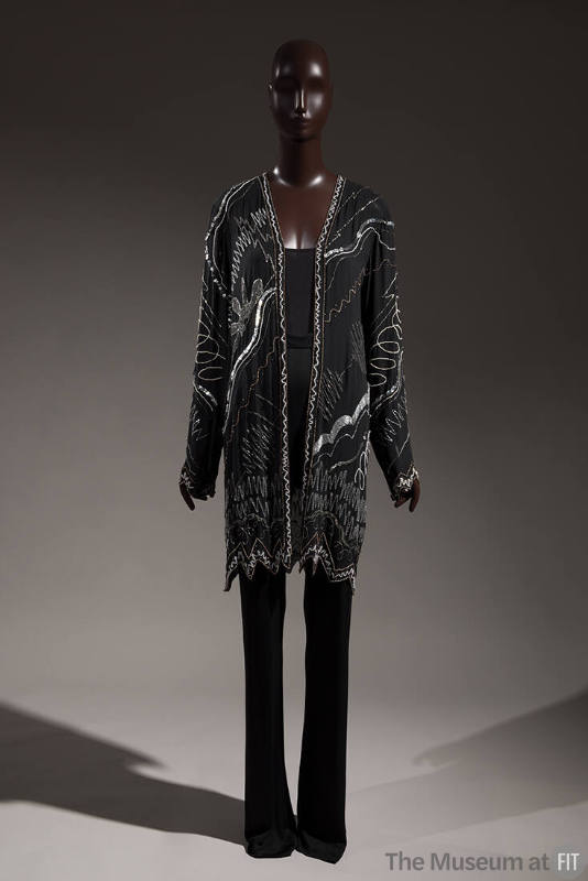 Black open front evening jacket with all-over silver and copper beaded designs in abstract wave…