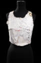 Sleeveless scoop neck bustier made of molded white cardboard with traces of print writing and f…