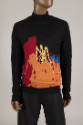 Man’s black mock neck sweater with abstract red, orange, yellow and blue design and black pants