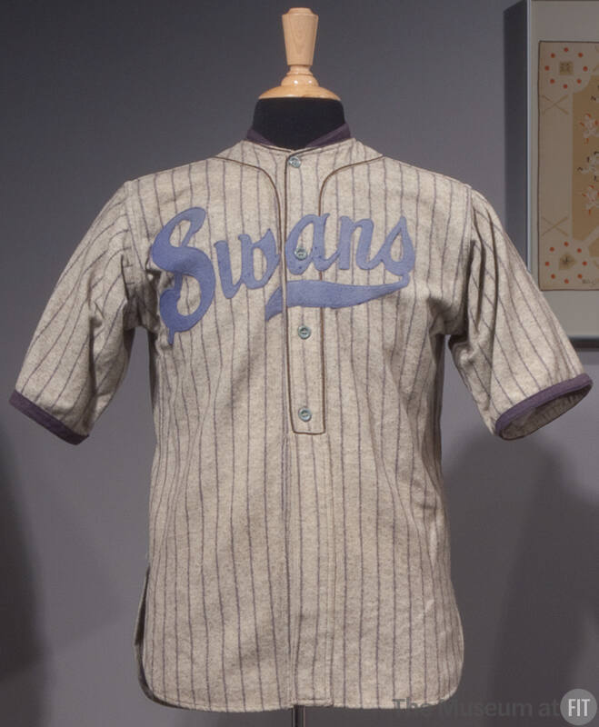 Light gray striped short sleeve baseball shirt with appliqued word Swans