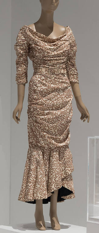 White with brown meandering line print ankle length evening dress with ¾ sleeves, cowl neck and…