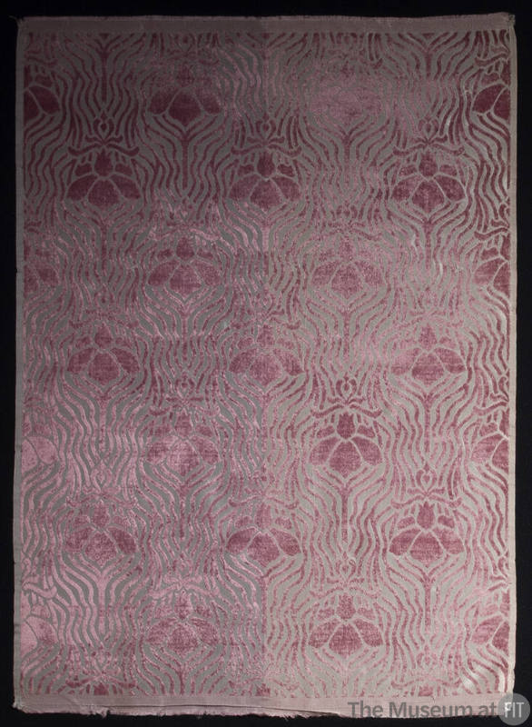 Rectangular velvet textile of purple floral and line motifs on ground that is grey on left and …