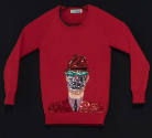 Red sweater with large center appliqué of a covered face wearing a hat in red, black, green, pu…