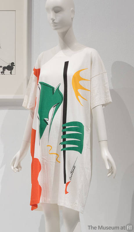 White oversize short sleeve t-shirt with abstract print in green, yellow, orange and black