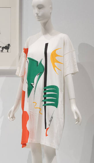 White oversize short sleeve t-shirt with abstract print in green, yellow, orange and black