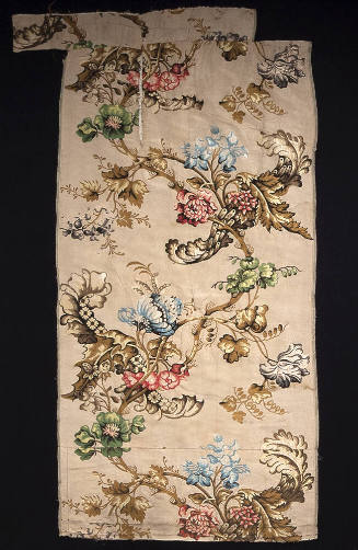 Rectangular brocade textile with floral and branch motifs in brown, green, yellow, blue, red, p…