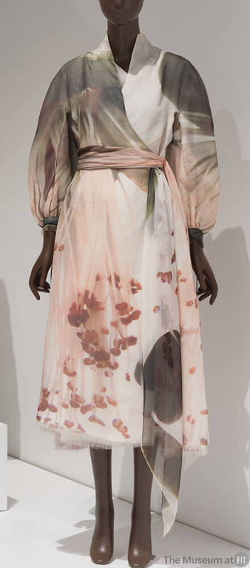 Ivory calf-length wrap dress with painted green, pink and brown watercolor motifs, ¾ length sle…