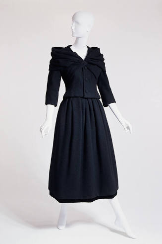 Black calf length dress and jacket with draped collar